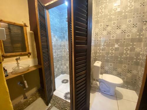 Et badeværelse på Casa Holy Ubatuba - Hospedagem Holística