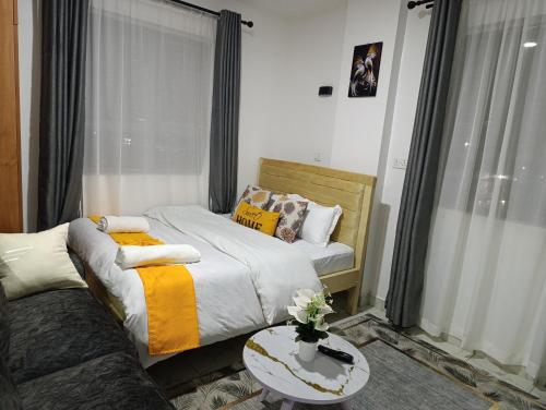 Ένα ή περισσότερα κρεβάτια σε δωμάτιο στο Zangem BnBs