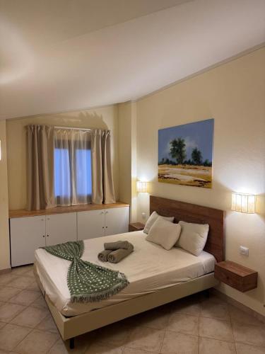 เตียงในห้องที่ Tropical Paradise