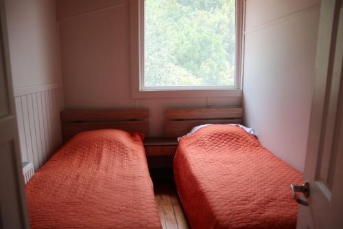 Giường trong phòng chung tại Amacoa