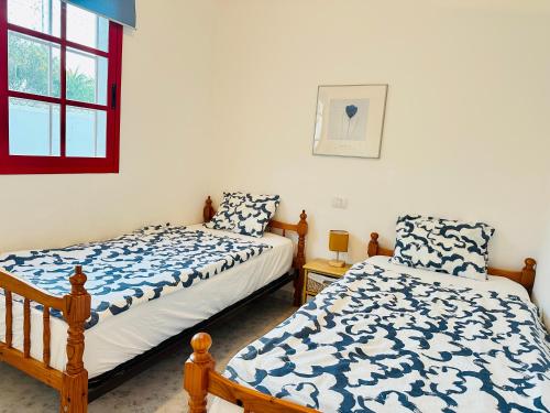 Ένα ή περισσότερα κρεβάτια σε δωμάτιο στο Casa Heidi