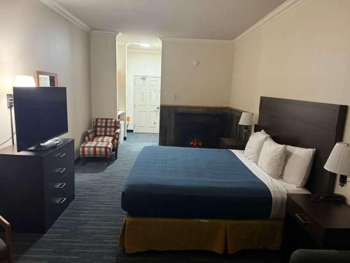 Un pat sau paturi într-o cameră la Ocean Paradise Hotel & Resort