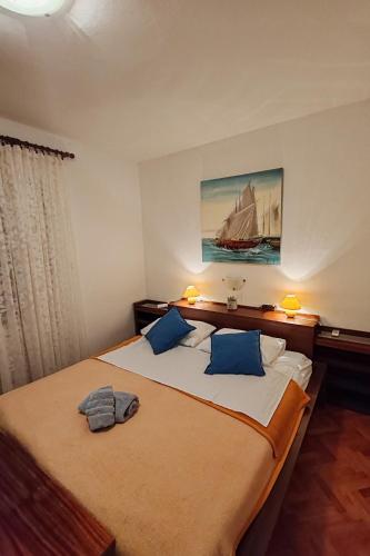 Apartments and rooms with parking space Banjol, Rab - 24964