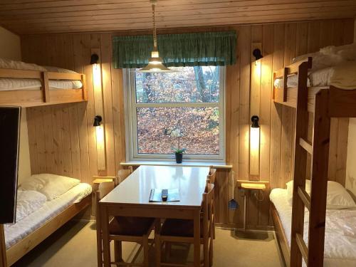 Giường trong phòng chung tại Holiday home with the barbecue