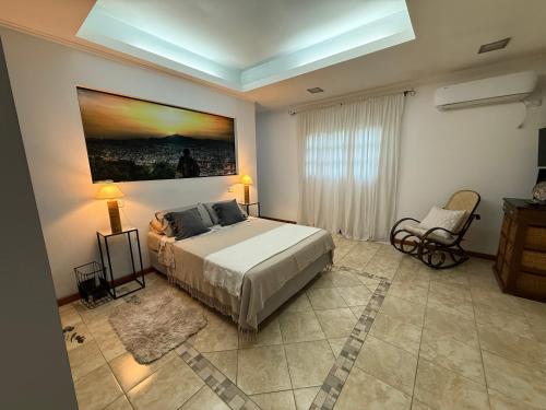 En eller flere senge i et værelse på La Mandrágora - Casa Quinta