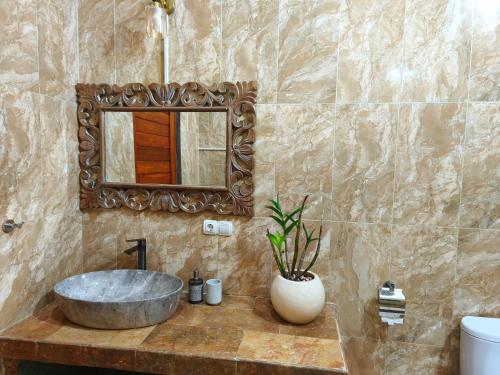 Ένα μπάνιο στο Ayanta Bali Homestay