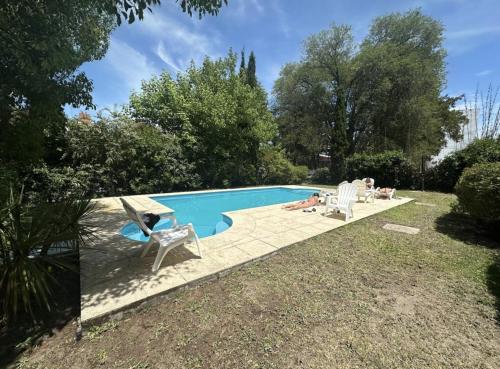 Πισίνα στο ή κοντά στο Monserrat Bungalows Con pileta y parrilla