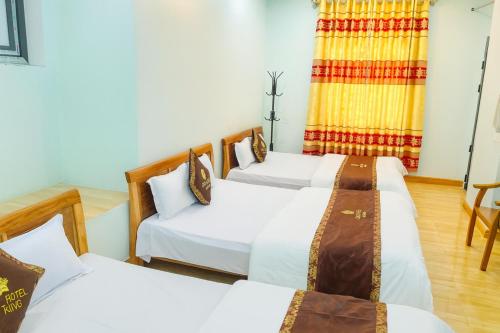 Giường trong phòng chung tại Ciao Homestay