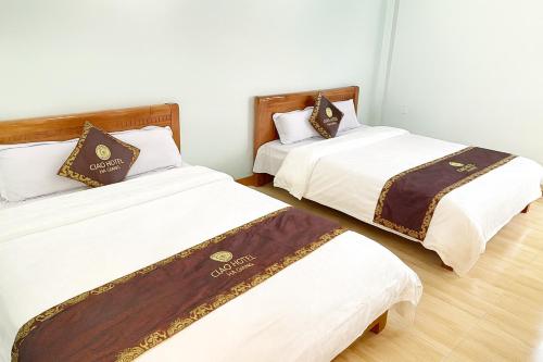 Giường trong phòng chung tại Ciao Homestay