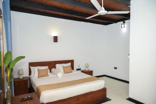 Postel nebo postele na pokoji v ubytování Ibbankatuwa Lake Resort