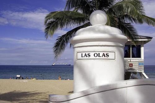 a sign that reads las olas on the beach at Cozy Little Bungalow in Fort Lauderdale