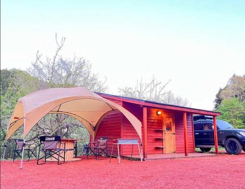 a cabin with a tent and a table and chairs at Our Minano Base - Vacation STAY 92840v in Minano