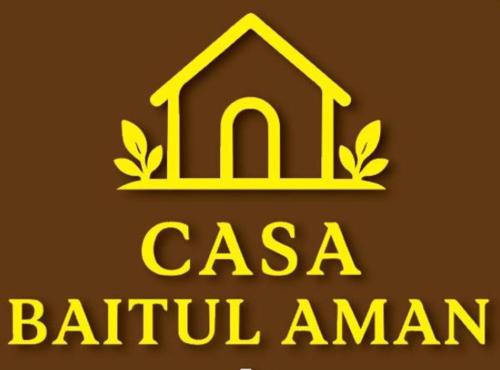 a yellow logo with the words casa batu aman at Casa Baitul Aman in Kuala Terengganu