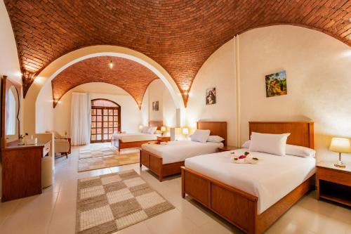 Ένα ή περισσότερα κρεβάτια σε δωμάτιο στο opal legacy luxor