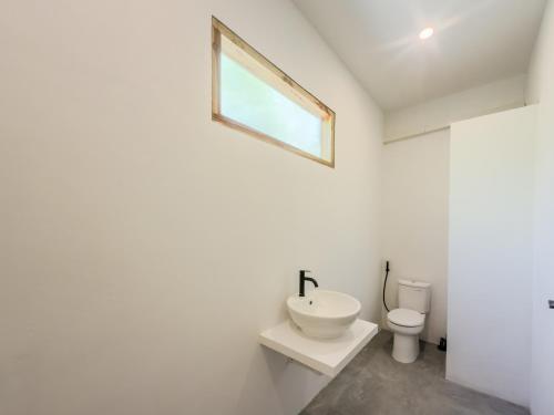 Koupelna v ubytování Luz Tropical Homestay