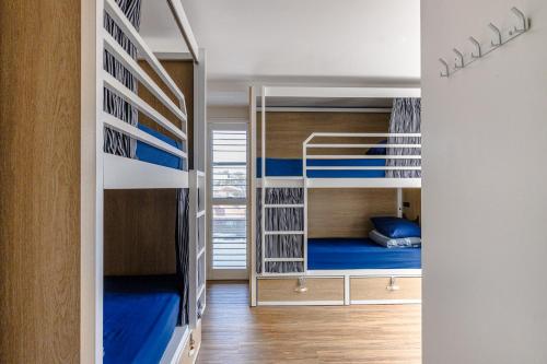 Ένα ή περισσότερα κρεβάτια σε δωμάτιο στο The Surf House