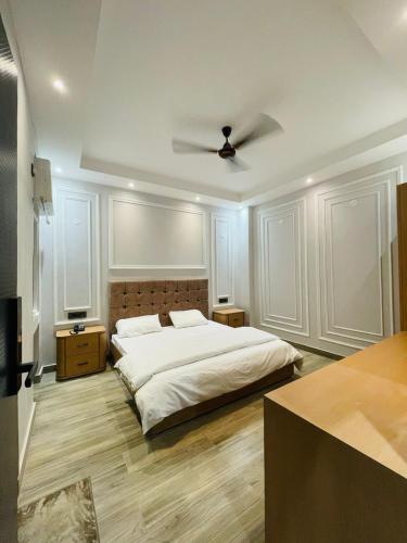 Ένα ή περισσότερα κρεβάτια σε δωμάτιο στο Amartarangini Hotel