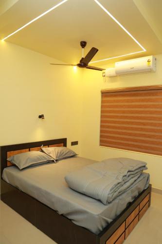 Postel nebo postele na pokoji v ubytování SJ Homes