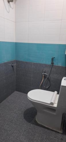 Koupelna v ubytování Monisha Residency Tiruvannamalai