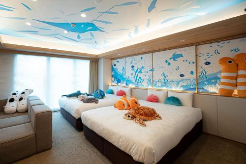 Postel nebo postele na pokoji v ubytování GOLD STAY Nagoya Osu