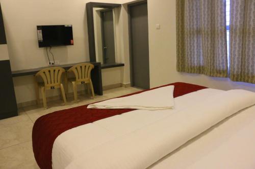 Μια τηλεόραση ή/και κέντρο ψυχαγωγίας στο JayPriya Residency