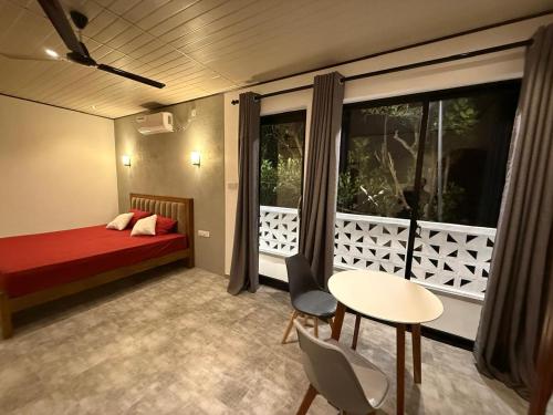 Postel nebo postele na pokoji v ubytování Wayside Loft