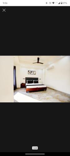 a picture of a living room with a couch at Hotel Eden La in Dera Bassi