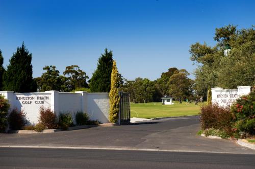 a gate at the entrance to the warrington heart golf club at Quest Moorabbin in Moorabbin