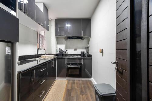 Nhà bếp/bếp nhỏ tại Psks Berry Luxury Apartments