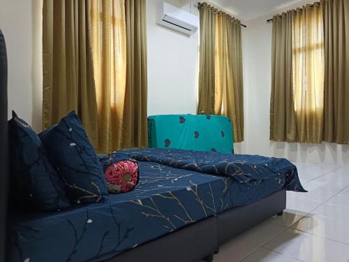 Un lugar para sentarse en Chek Embun Homestay