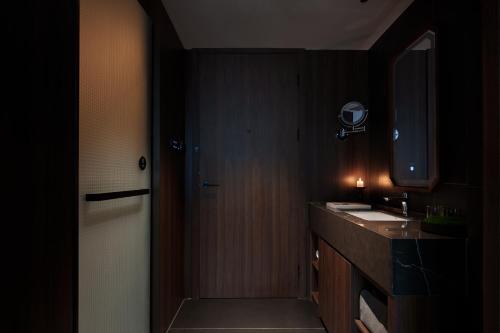 Η κουζίνα ή μικρή κουζίνα στο Neyar Tranquil Light and Shadow Aesthetics Hotel, Chongqing