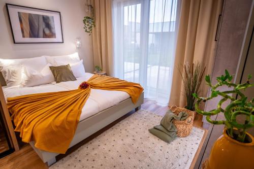 Ένα ή περισσότερα κρεβάτια σε δωμάτιο στο Between Rivers Apartments