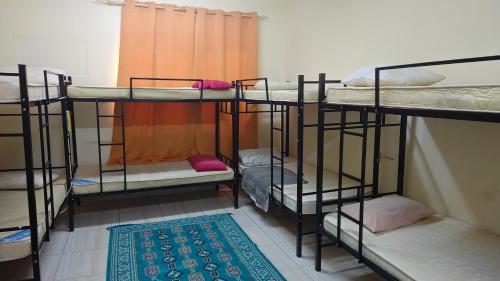 Postel nebo postele na pokoji v ubytování Oman 1