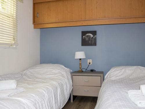 Postel nebo postele na pokoji v ubytování Huize Vriendschap in Hattemerbroek