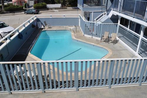 an overhead view of a swimming pool in a building at Salt Air Lodge in Santa Cruz
