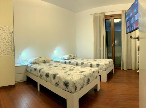 Ένα ή περισσότερα κρεβάτια σε δωμάτιο στο Ciconi Apartment