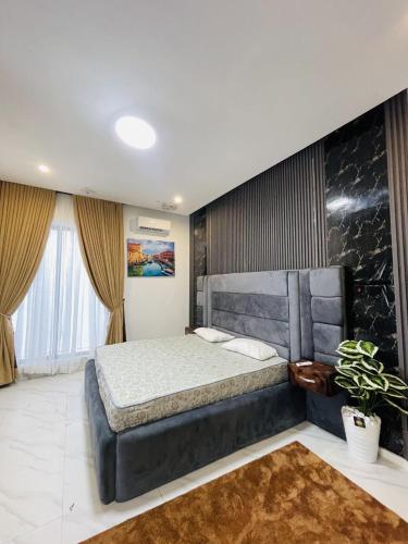 Ένα ή περισσότερα κρεβάτια σε δωμάτιο στο Carter Homes