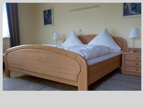 Ένα ή περισσότερα κρεβάτια σε δωμάτιο στο Ferienwohnung Konzell