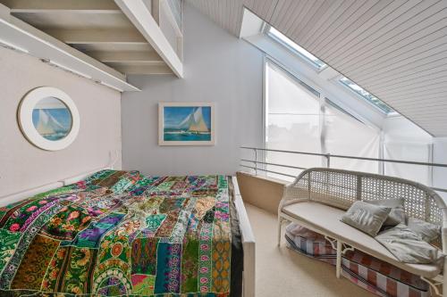 Ένα ή περισσότερα κρεβάτια σε δωμάτιο στο Villa sur la Côte Sauvage