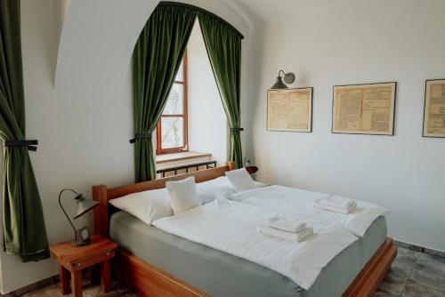 Postel nebo postele na pokoji v ubytování Penzion Šatlava