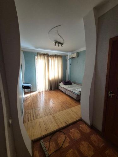 מיטה או מיטות בחדר ב-2 - room Apartment