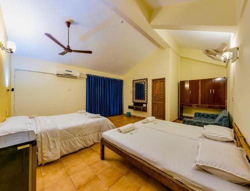 En eller flere senge i et værelse på Hotel Lua Nova