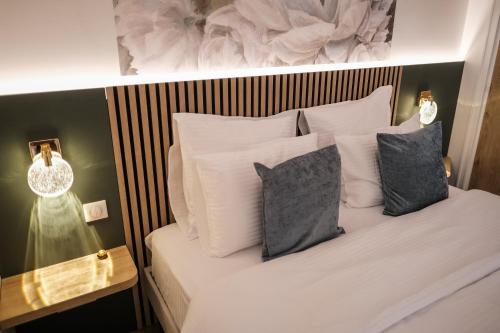 Ένα ή περισσότερα κρεβάτια σε δωμάτιο στο Le Stengel Cocon Design Amiens Centre