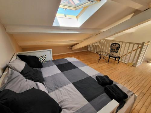 Postel nebo postele na pokoji v ubytování La Terrasse des Lices