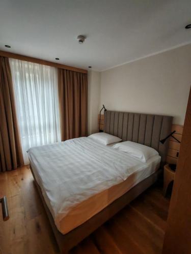 En eller flere senge i et værelse på Apartman 601 Ema Montera