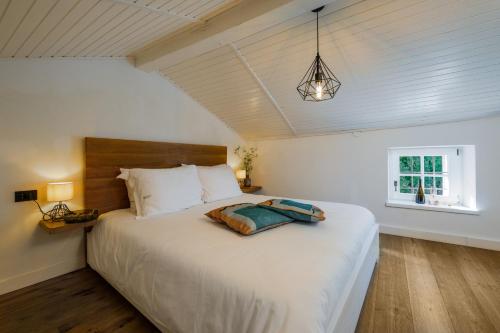 En eller flere senge i et værelse på Casa mille olivi