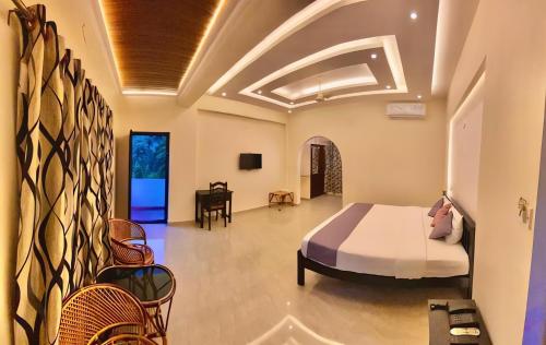 Ένα ή περισσότερα κρεβάτια σε δωμάτιο στο PURNA RIVERA MUNNAR