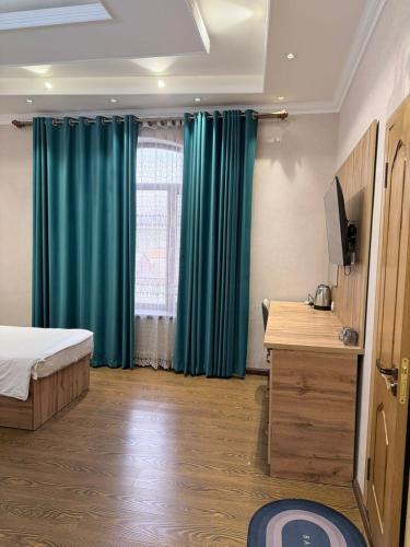 Postel nebo postele na pokoji v ubytování Soro Hotel