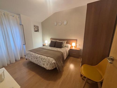 Postel nebo postele na pokoji v ubytování Apartamentos Turísticos Clavero 1