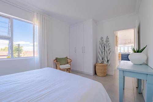 Ένα ή περισσότερα κρεβάτια σε δωμάτιο στο Serenity on 6th Luxury holiday home